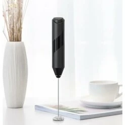 MODOU Espumador De Leche Eléctrico, Espumador De Leche Eléctrico Mini Batidor De Huevos, Mezclador De Bebidas Con Batidor De Acero Inoxidable Y Soporte Para Capuchino, Latte, Lat, Chocolate Caliente,